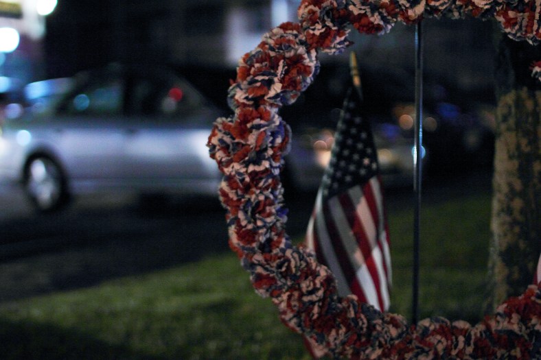 A wreath and flag at the Arlington War Memorial. December 7th is National Pearl Harbor Remembrance Day.December 6, 2012.