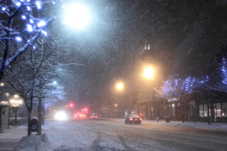 Cars carefully make their way down Arlington's main thoroughfare, Massachusetts Avenue, during a late December storm.December 29, 2012.
