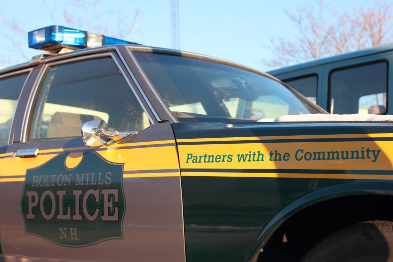 A Holton Mills police car, used in the upcoming movie 'Labor Day' starring Josh Brolin and Kate Winslet, which was recently shot in the area, sitting in the lot at Anderson Automotive on Broadway.January 6, 2013.