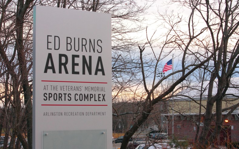 A new sign bears the name of Arlington's skating rink, Ed Burns Arena, after Arlington High Hockey coach Ed Burns who lead the varsity team for 50 years.January 14, 2013.