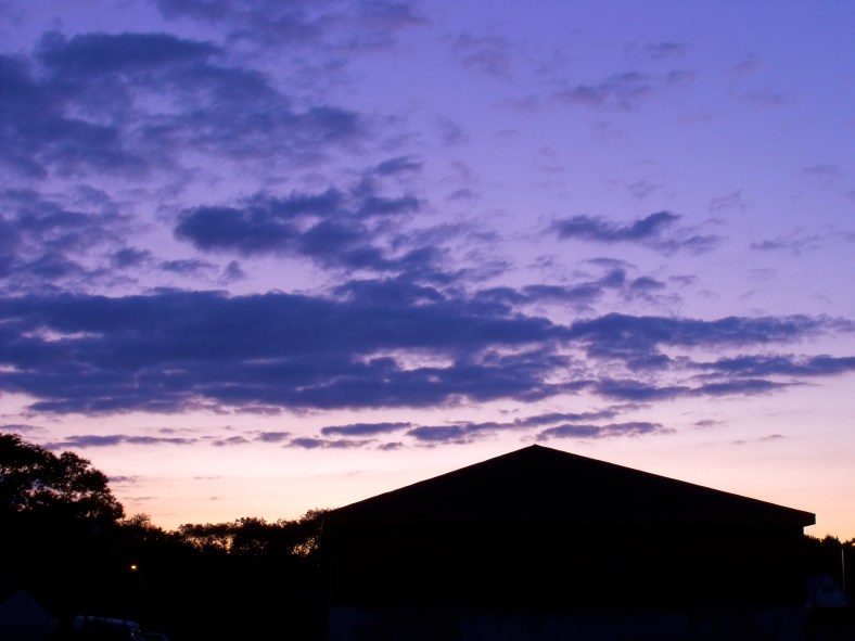 A Department of Public Works shed silhouetted against the twilight sky.June 29, 2010.