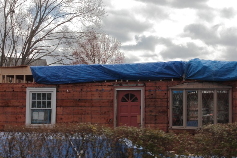 An existing house on Summer Street prepared for the construction of a  second story. April 13, 2013.