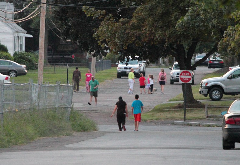 Folks from the neighborhood around the Thompson School out and about on a warm summer evening. August 31, 2012.