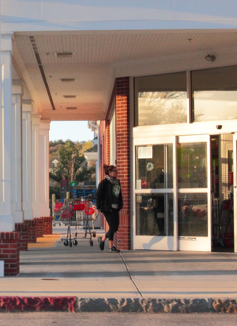 A woman walks into the CVS next to Arlington High School. April 21, 2013.