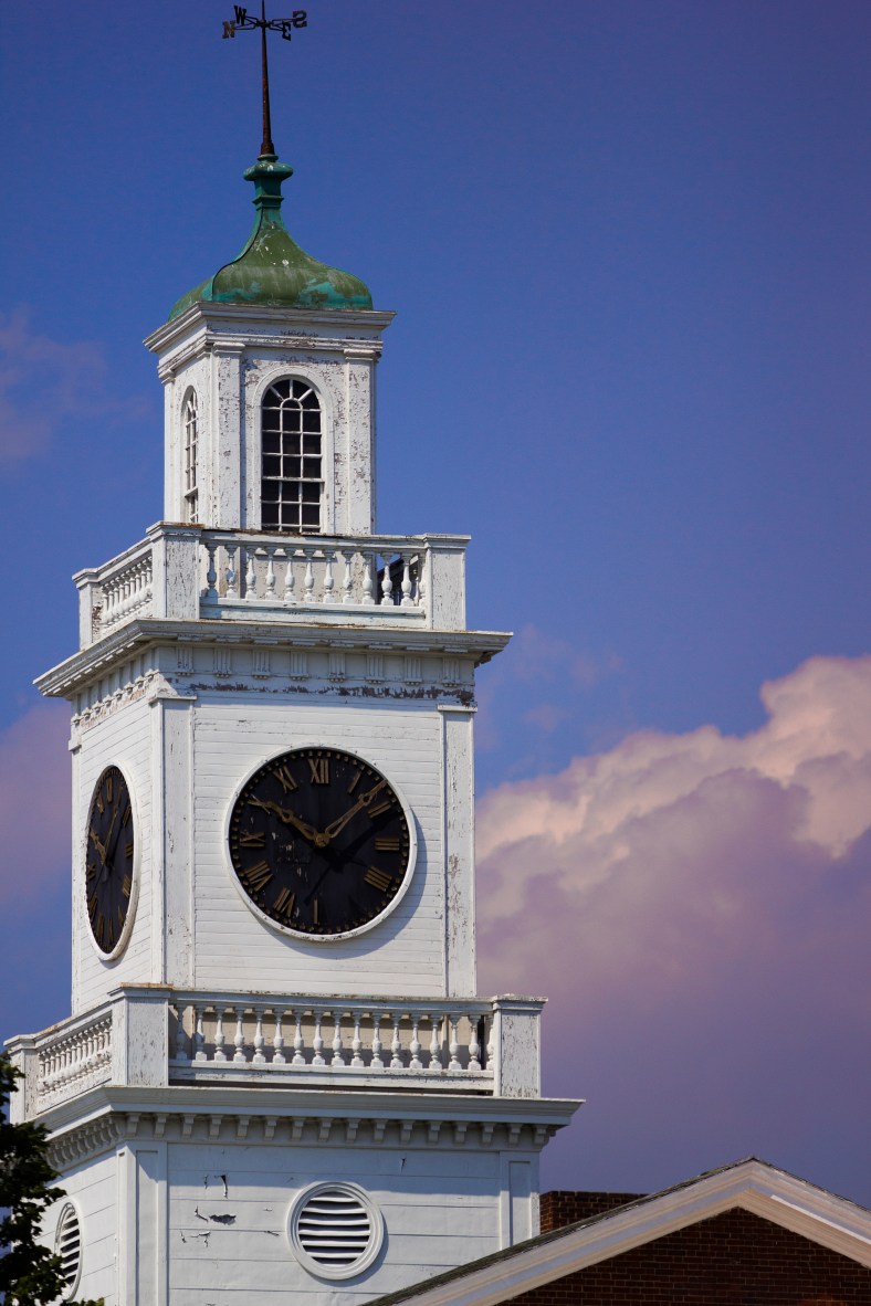 The clock tower of Arlington High School, ready and waiting for a new coat of paint and a working timepiece. July 19, 2013.
