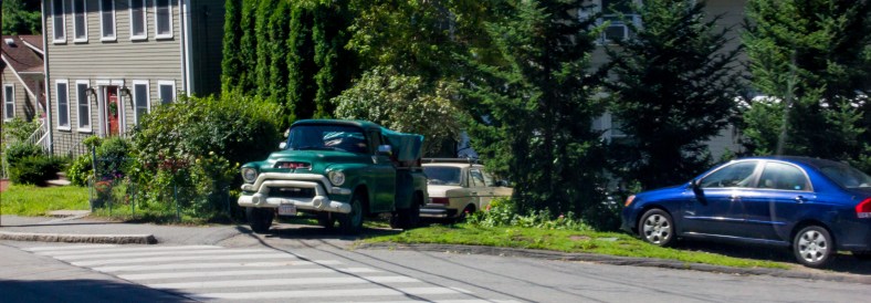 A well maintained GMC pickup in the driveway of a Pine Street homE. August 14, 2013.