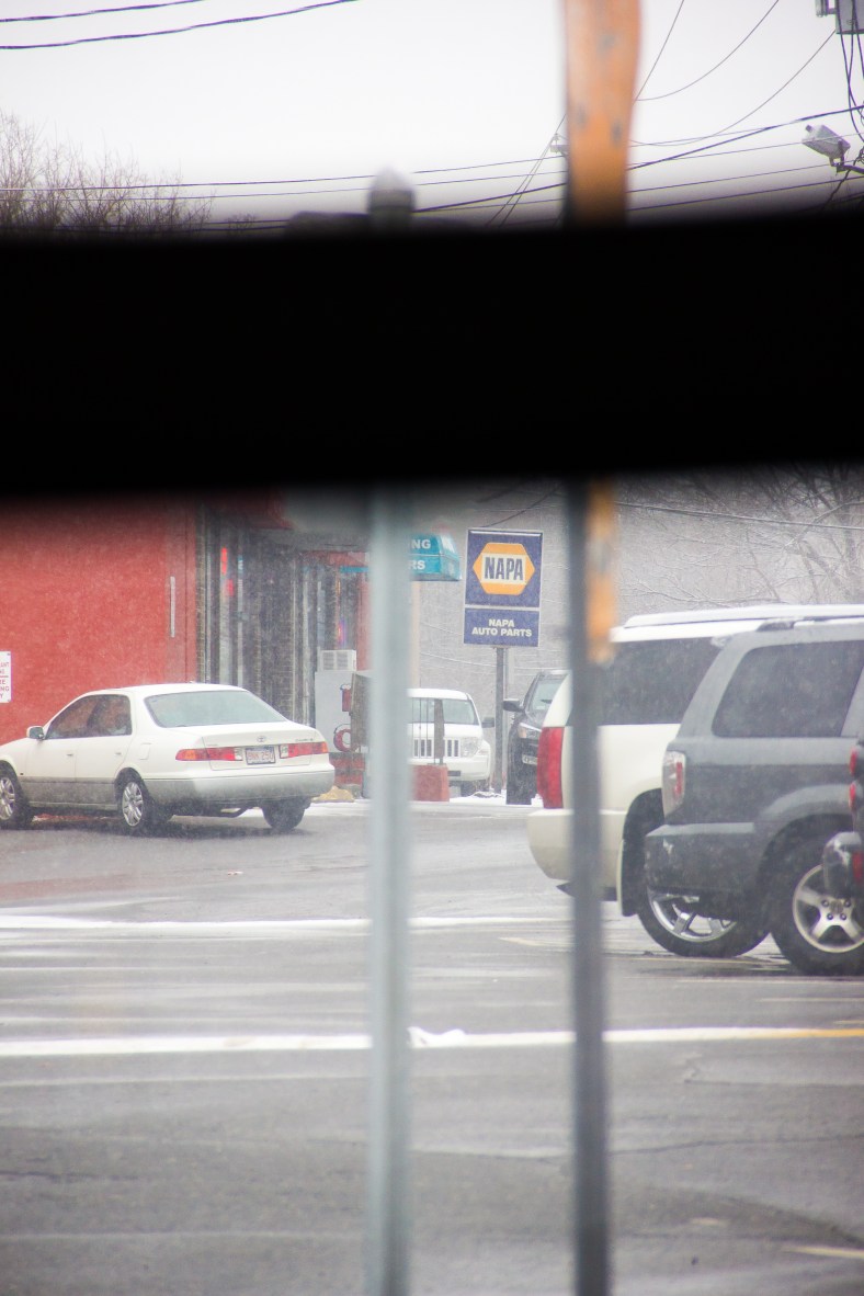 A view of Summer Street businesses from the route 67 bus. February 3, 2014.