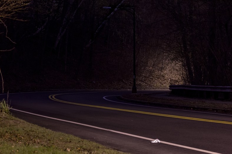 Streetlights illuminate spots along Mystic Valley Parkway as it ribbons around the Lower Mystic Lake. May 2, 2014.