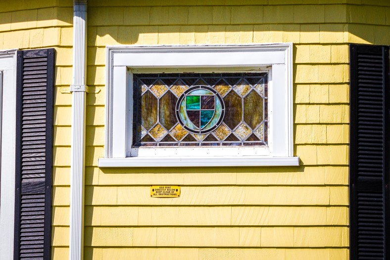 A stained glass window displayed in the side of a Rockland Avenue home. May 12, 2014.