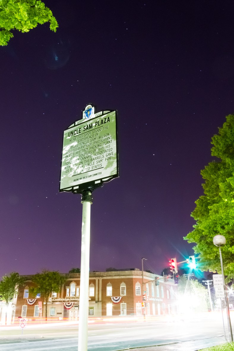 The nine month old historical information sign marking Uncle Sam Plaza stands tall in Arlington Center. June 1, 2014.