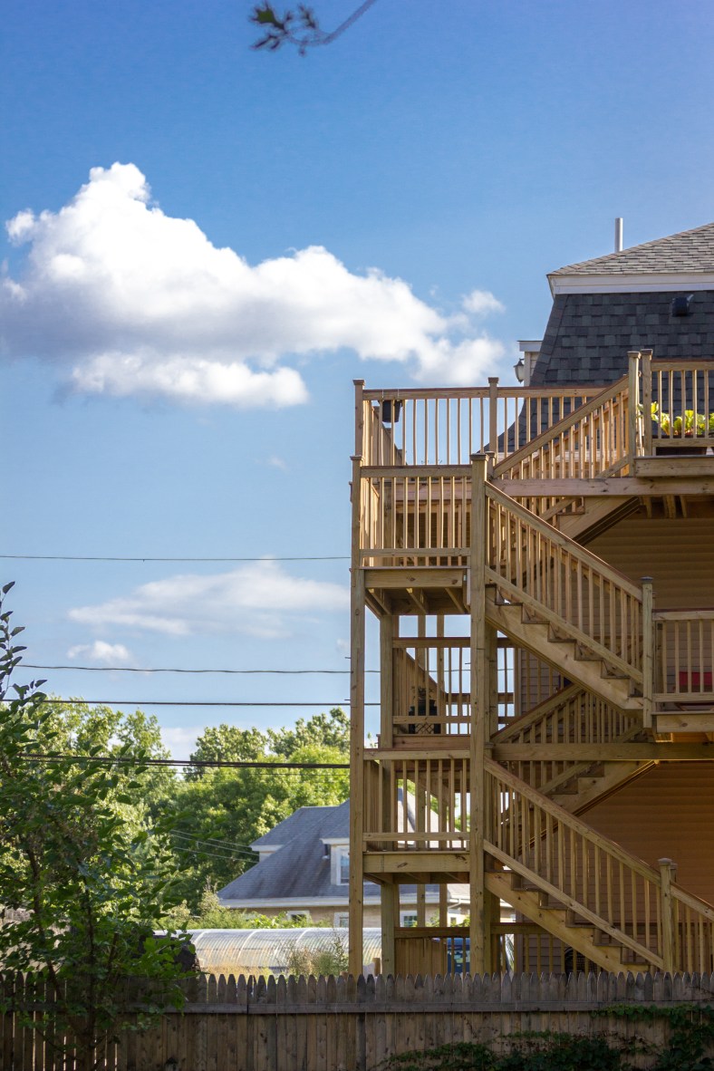 A recently built wooden deck on a two family home as seen from Mystic Valley Parkway. August 8, 2014.