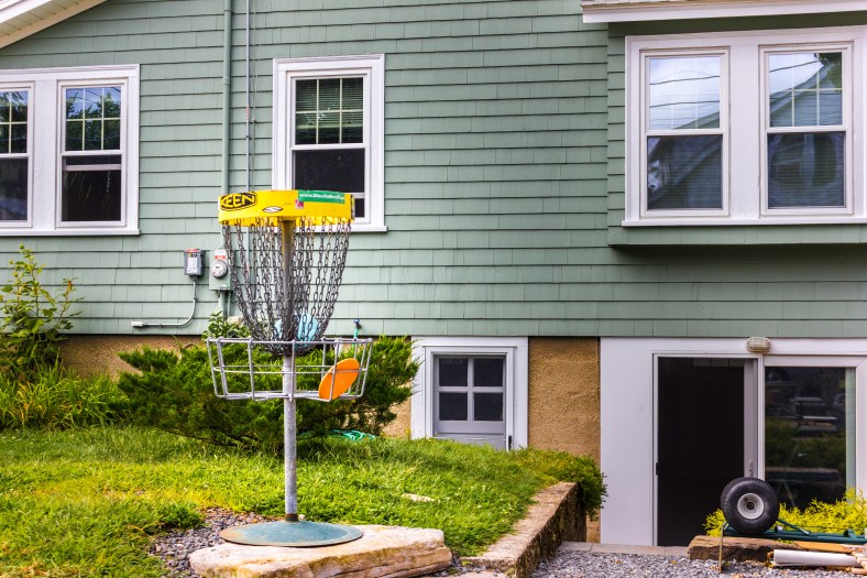A disc golf goal in the yard of a Wright Street home. August 31, 2014.