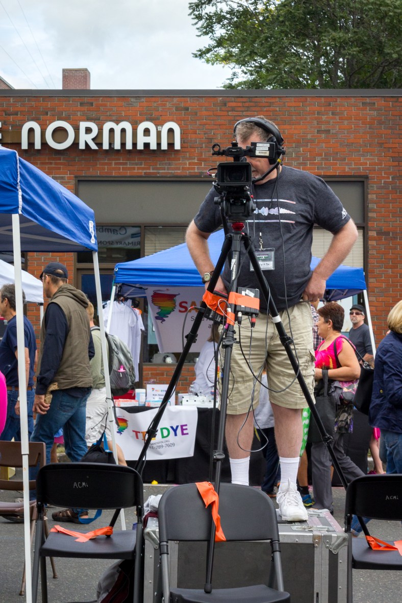 An ACMi cameraman capturing the main stage entertainment outside of Town Hall during Town Day. September 13, 2014.