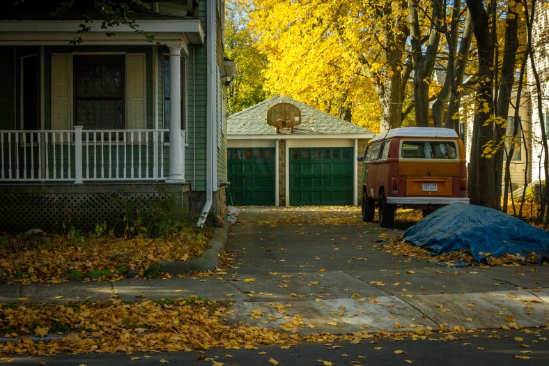 A high-clearance camper van, customized for the occasional off-road experience, in the driveway of a Broadway residence. November 10, 2014.