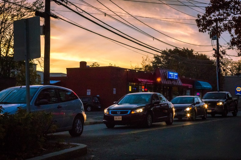 Vehicles pile up at the Summer Street and Mill Street traffic light under a brilliant twilight sky. November 10, 2014.