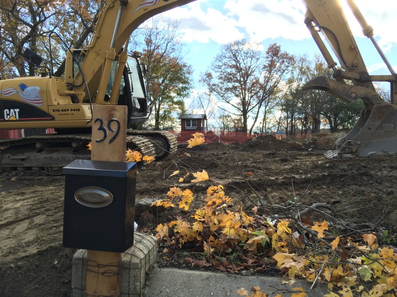 The site of a house freshly demolished on Epping Street.  While the building is gone, the memory of tragic events are much harder to erase. November 14, 2014.