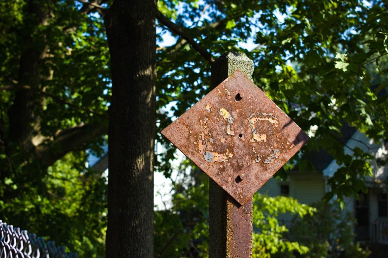 An old rusted railroad sign along the Minuteman Bikeway. September 11, 2013.