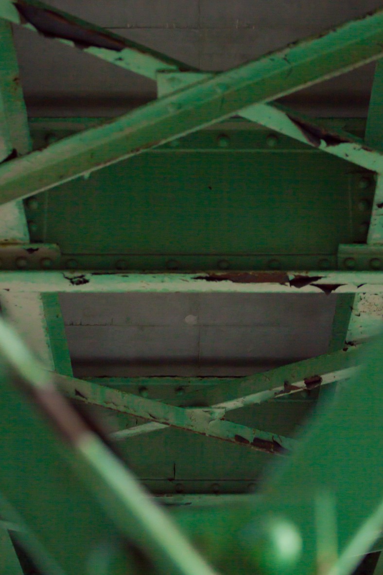 The steel of a bridge over that used to carry the Boston & Maine railroad over Brattle Street. November 15, 2013.