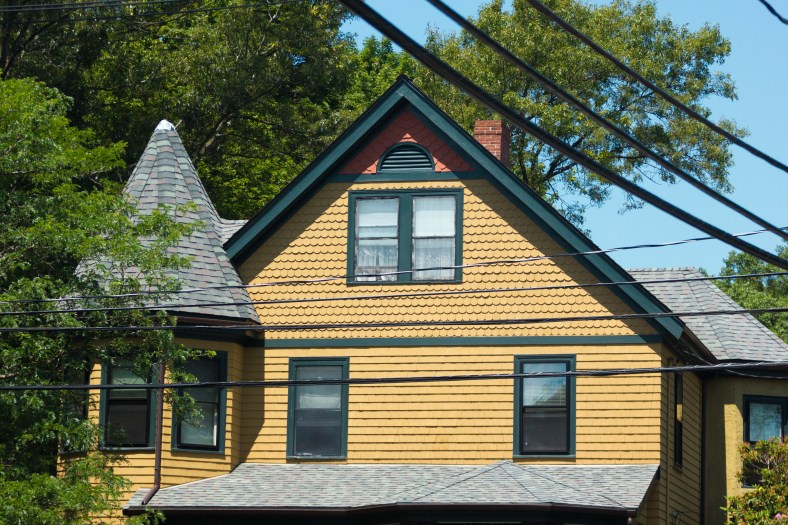 An example of fish scale shingle siding on a Jason Street home. July 11, 2015.