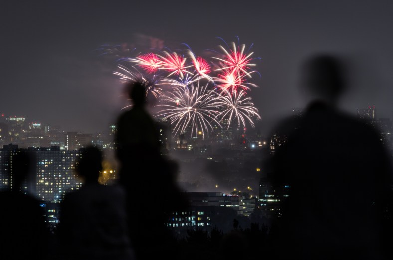 People watch Boston's fireworks from Robbins Farm Park, a yearly tradition for many Arlingtonians. July 04, 2012.