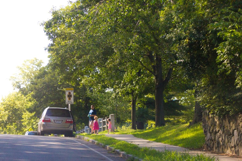 A family heads toward the van after some play time at Robbins Farm Park. August 05, 2015.