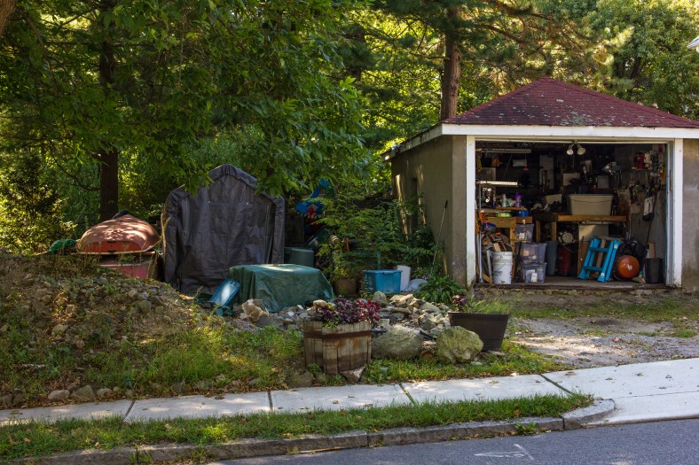 A garage and side yard of a Washington Street home. September 11, 2013.