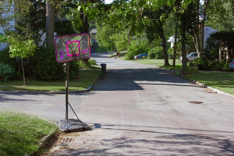 An adjustable height basketball goal on Woodside Lane. September 11, 2013.