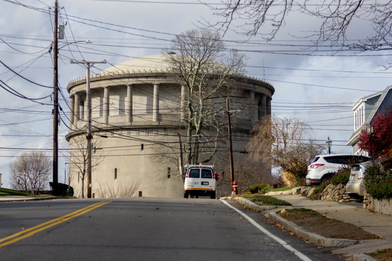 An electric company truck parked on Eastern Avenue in front of the imposing Park Avenue water tower. November 26, 2015.