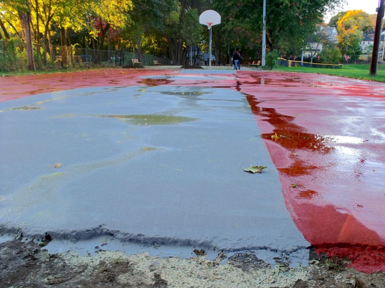 Puddles on the basketball court at Summer Street field. October 21, 2010.