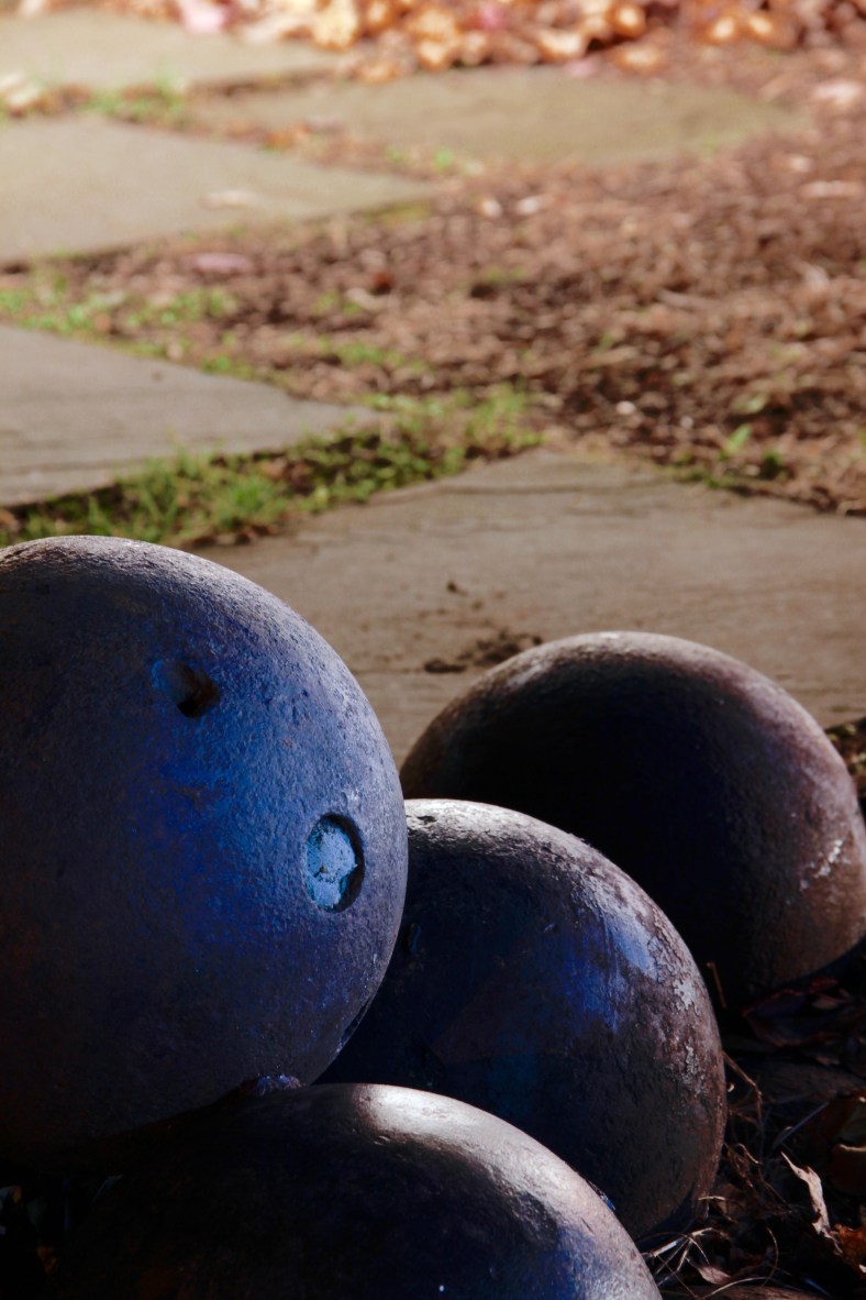 Cannon balls stacked as part of a monument in Arlington Center. November 26, 2011.